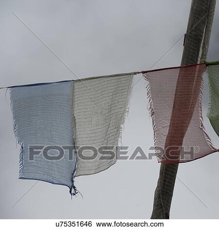 Stock Photograph - Prayer flags in Trongsa District. Fotosearch