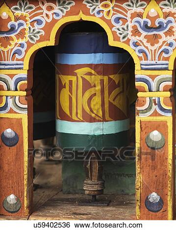 Prayer wheels at a temple, Bhutan View Large Photo Image Stock Photograph - Prayer wheels at a temple, Bhutan. Fotosearch