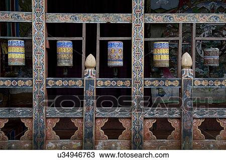 Prayer wheels at the temple in Trongsa Dzong, Trongsa, Bhutan View Large Photo Image Stock Image - Prayer wheels at the temple in Trongsa Dzong, Trongsa, Bhutan. Fotosearch