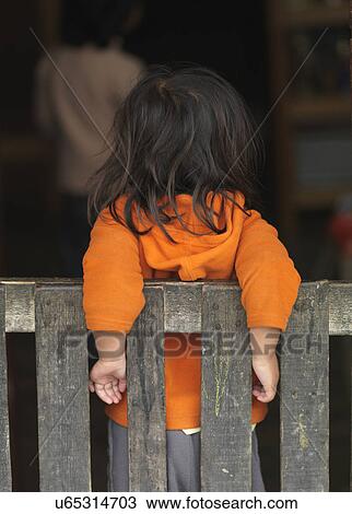 Rear view of a girl, Chokhor Town, Bumthang District, Bhutan View Large Photo Image Stock Image - Rear view of a girl, Chokhor Town, Bumthang District, Bhutan. Fotosearch