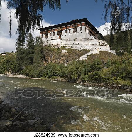 Stock Photo - Rinpung Dzong on a hill, Paro Valley, Paro District, Bhutan. Fotosearch