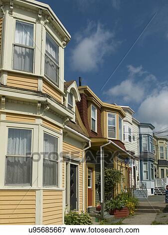 Stock Photo - Row houses in Quidi Vidi, St. John's, Newfoundland and Labrador, Canada. Fotosearch