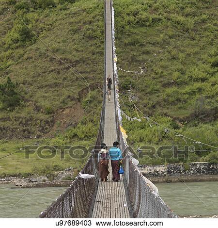 Suspension bridge across the Puna Tsang River, Punakha District, Bhutan View Large Photo Image Stock Image - Suspension bridge across the Puna Tsang River, Punakha District, Bhutan. Fotosearch