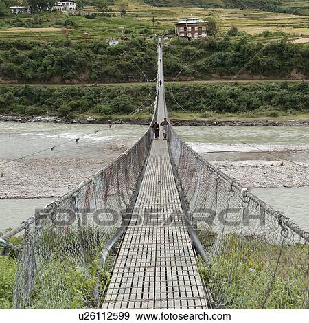 Stock Photo - Suspension bridge in Punakha District, Puntshang Chhu River. Fotosearch