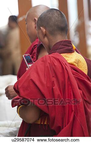 Two monks in a market, Thimphu, Bhutan View Large Photo Image Picture - Two monks in a market, Thimphu, Bhutan. Fotosearch