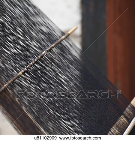 Weaving textiles on a loom in Chhume Valley, Bhutan View Large Photo Image Stock Photo - Weaving textiles on a loom in Chhume Valley, Bhutan. Fotosearch