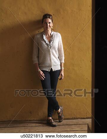 Stock Image - Woman at Punakha Monastery, Punakha, Bhutan. Fotosearch