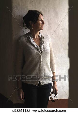 Stock Image - Woman at Punakha Monastery, Punakha, Bhutan. Fotosearch