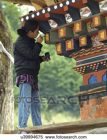 Woman calligraphing at Tamshing Monastery, Chokhor Valley, Bumthang District, Bhutan View Large Photo Image Stock Photography - Woman calligraphing at Tamshing Monastery, Chokhor Valley, Bumthang District, Bhutan. Fotosearch