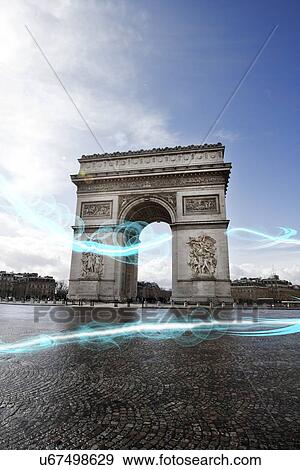 Stock Photo - Blue streak of lights at Arc de Triomphe. Fotosearch