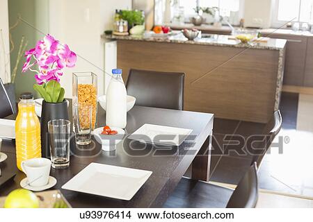 Picture - Breakfast on dining table at home. Fotosearch