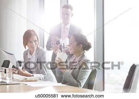 Business people having lunch break View Large Photo Image Stock Image - Business people having lunch break. Fotosearch