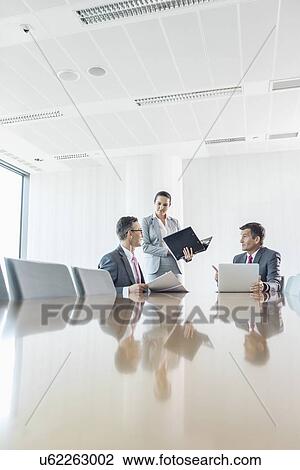 Business people in meeting View Large Photo Image Stock Image - Business people in meeting. Fotosearch