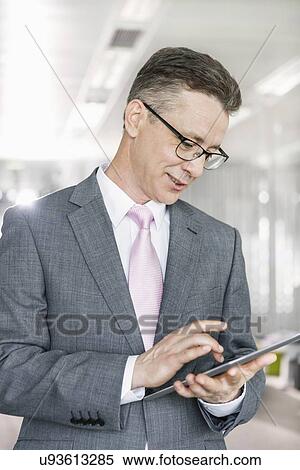 Stock Photography - Business people talking during coffee break. Fotosearch