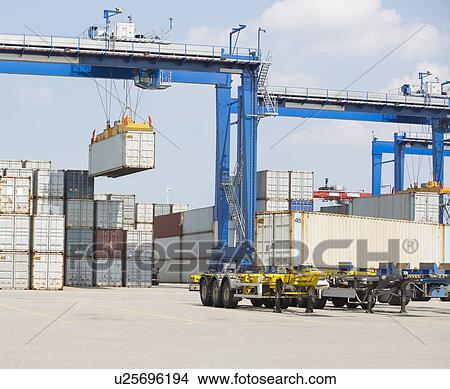 Cargo containers in shipping yard View Large Photo Image Picture - Cargo containers in shipping yard. Fotosearch