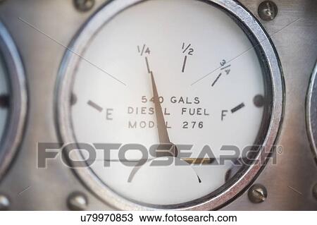 Stock Image - Close-up of diesel fuel gauge of yacht. Fotosearch