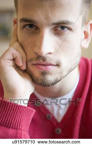 Close-up portrait of confident man in cafe View Large Photo Image Stock Image - Close-up portrait of confident man in cafe. Fotosearch