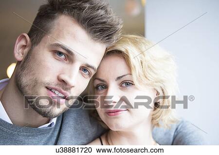 Close-up portrait of young couple in cafe View Large Photo Image Stock Image - Close-up portrait of young couple in cafe. Fotosearch