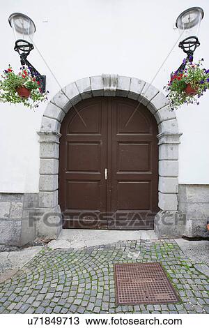 Stock Image - Closed wooden door of house, Zagreb, Croatia. Fotosearch