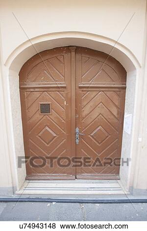 Stock Photo - Closed wooden door of house, Zagreb, Croatia. Fotosearch
