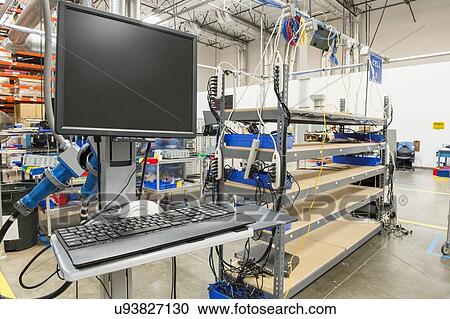Stock Image - Desktop computer in manufacturing industry. Fotosearch