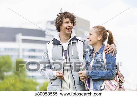 Happy young college students at campus View Large Photo Image Stock Photography - Happy young college students at campus. Fotosearch