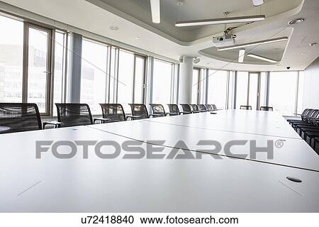 Interior of empty conference room in creative office View Large Photo Image Stock Image - Interior of empty conference room in creative office. Fotosearch