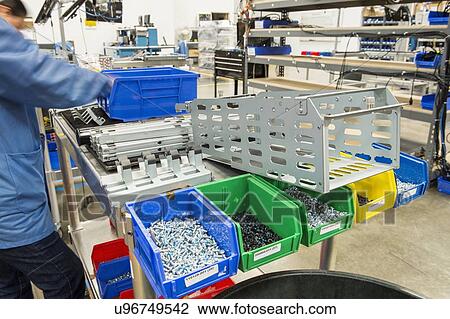 Midsection of female engineer working in computer manufacturing industry View Large Photo Image Stock Image - Midsection of female engineer working in computer manufacturing industry. Fotosearch
