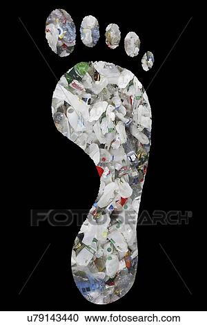 Stock Image - Pile of plastic bottles in footprints over black background. Fotosearch