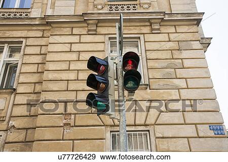 Red traffic light against building, Prague, Czech Republic View Large Photo Image Stock Photo - Red traffic light against building, Prague, Czech Republic. Fotosearch