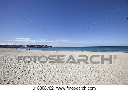 Stock Image - Scenic view of Bondi beach against blue sky, Sydney, Australia. Fotosearch