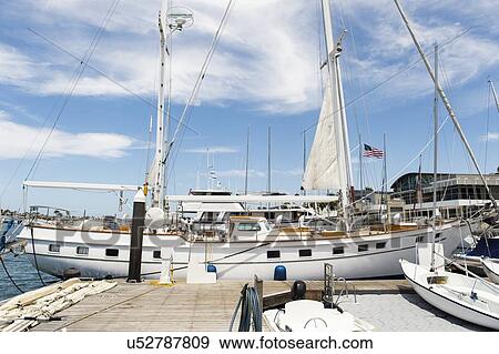 Yacht moored at dock View Large Photo Image Stock Photo - Yacht moored at dock. Fotosearch