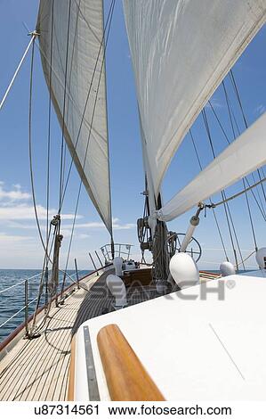 Yacht sailing in sea View Large Photo Image Stock Image - Yacht sailing in sea. Fotosearch