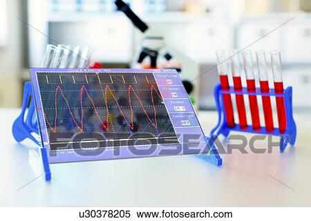 Stock Photography - Data on a monitor in a lab. Fotosearch