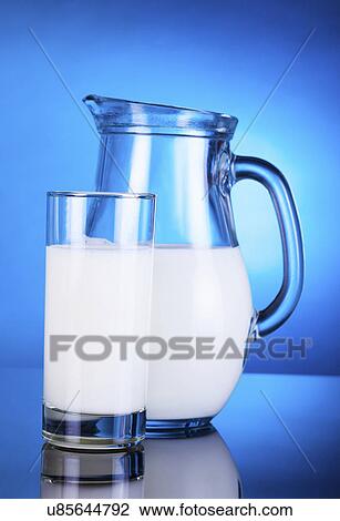 Stock Image - Jug and glass with milk. Fotosearch