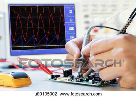 Stock Image - Making an electronic micro processor. Fotosearch