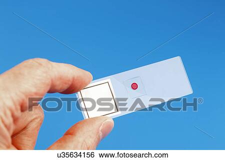 Stock Photograph - Microscope slide. Fotosearch
