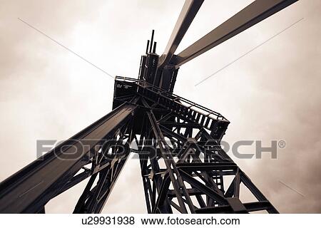 Stock Photo - Oil drill, low angle view. Fotosearch