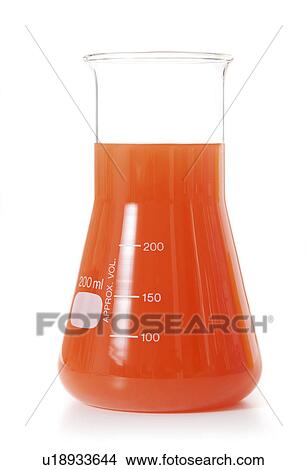 Picture - Orange liquid in a conical flask. Fotosearch