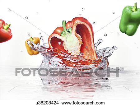 Stock Illustration - Peppers splashing into water, artwork. Fotosearch