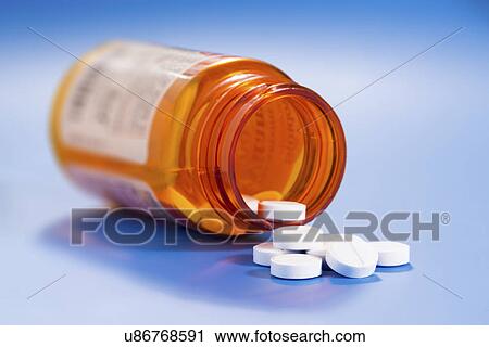 Pills and pill bottle, still life View Large Photo Image Stock Image - Pills and pill bottle, still life. Fotosearch