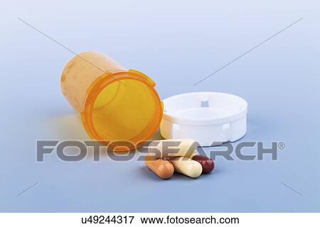 Pills and pill bottle View Large Photo Image Stock Photo - Pills and pill bottle. Fotosearch