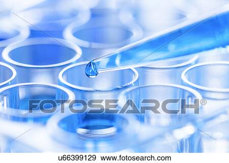 Stock Photo - Pipette and test tubes. Fotosearch