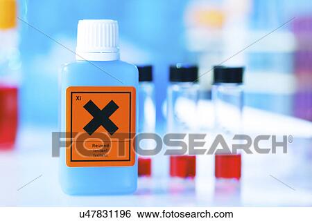 Plastic bottle with warning sign View Large Photo Image Stock Photograph - Plastic bottle with warning sign. Fotosearch