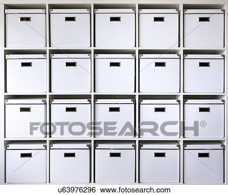 Storage boxes on shelves View Large Photo Image Stock Photograph - Storage boxes on shelves. Fotosearch
