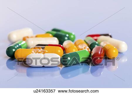 Tablets and capsules View Large Photo Image Stock Photo - Tablets and capsules. Fotosearch