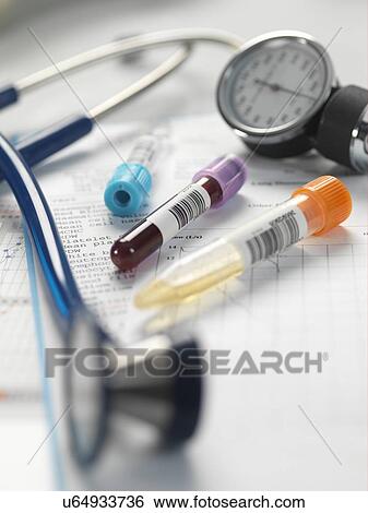 Stock Photograph - Vials, stethoscope and paperwork. Fotosearch