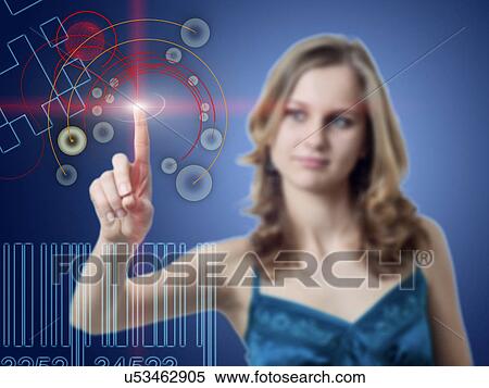 Stock Photography - Woman using touchscreen technology. Fotosearch