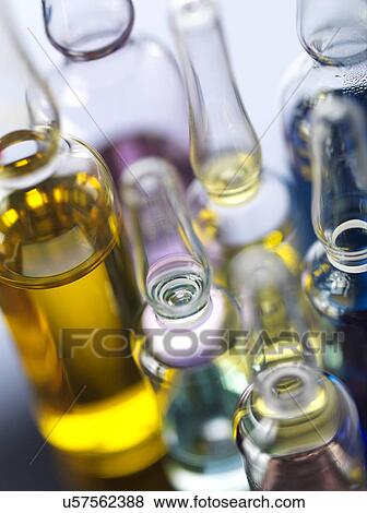 A variety of drug treatments in glass bottles, close-up View Large Photo Image Stock Photo - A variety of drug treatments in glass bottles, close-up. Fotosearch