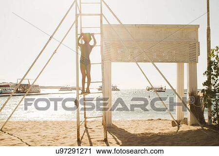 Boy playing by seaside, Sharm El Sheikh, Egypt View Large Photo Image Stock Image - Boy playing by seaside, Sharm El Sheikh, Egypt. Fotosearch
